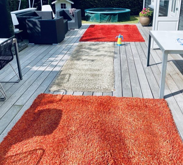 Udendørs rens af løse tæpper